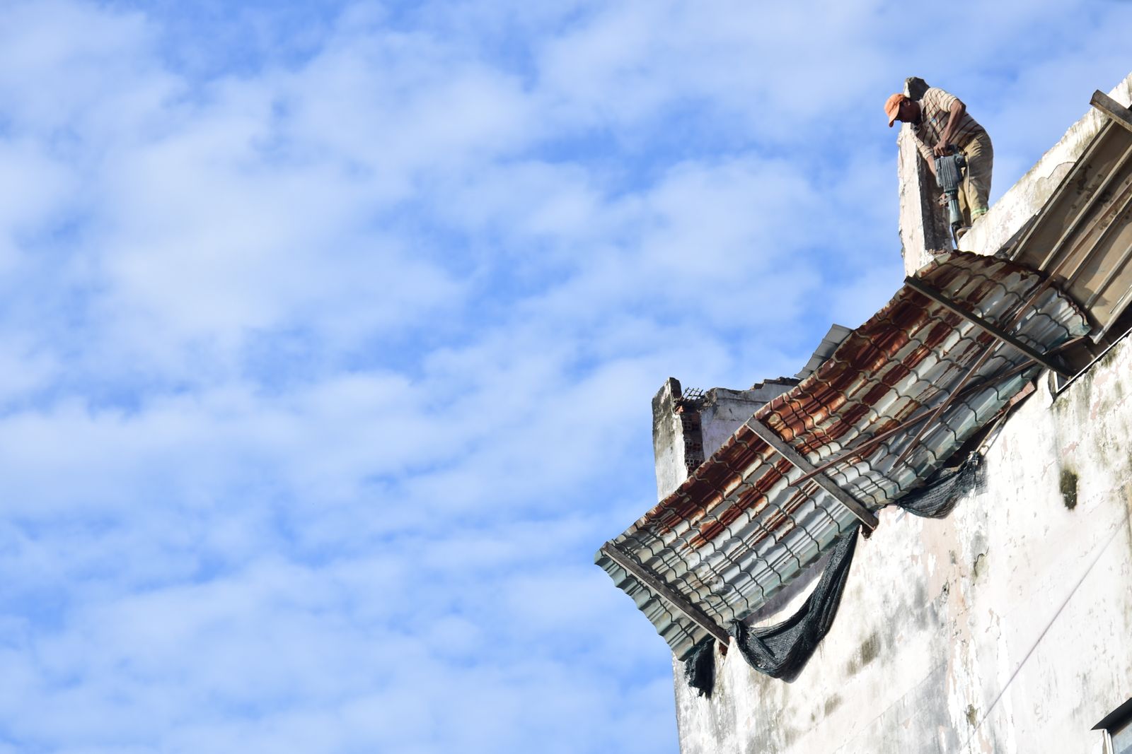 Northgate roofer repairing a roof on a bright sunny day