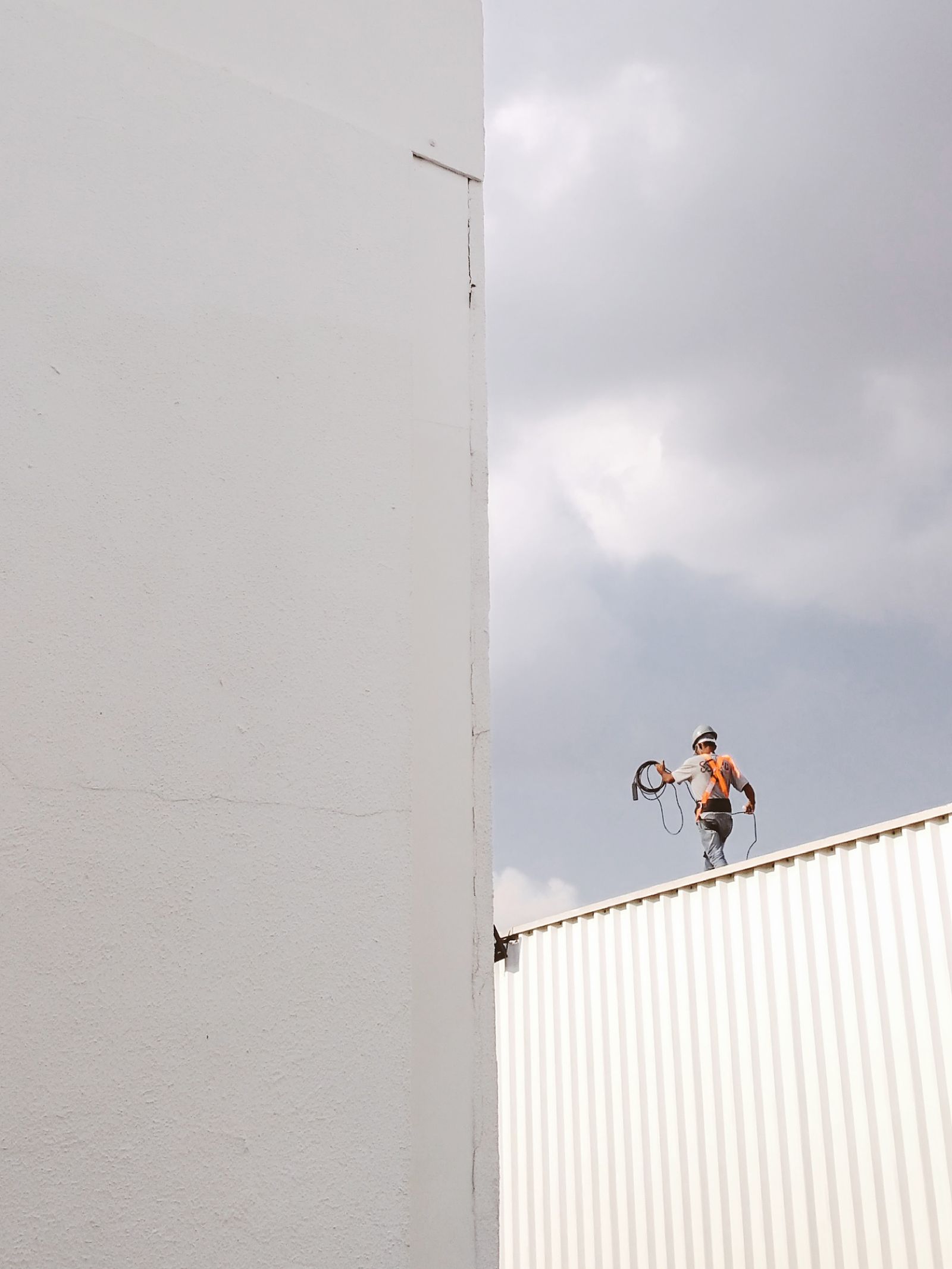 Northgate roofer standing on a finished rooftop